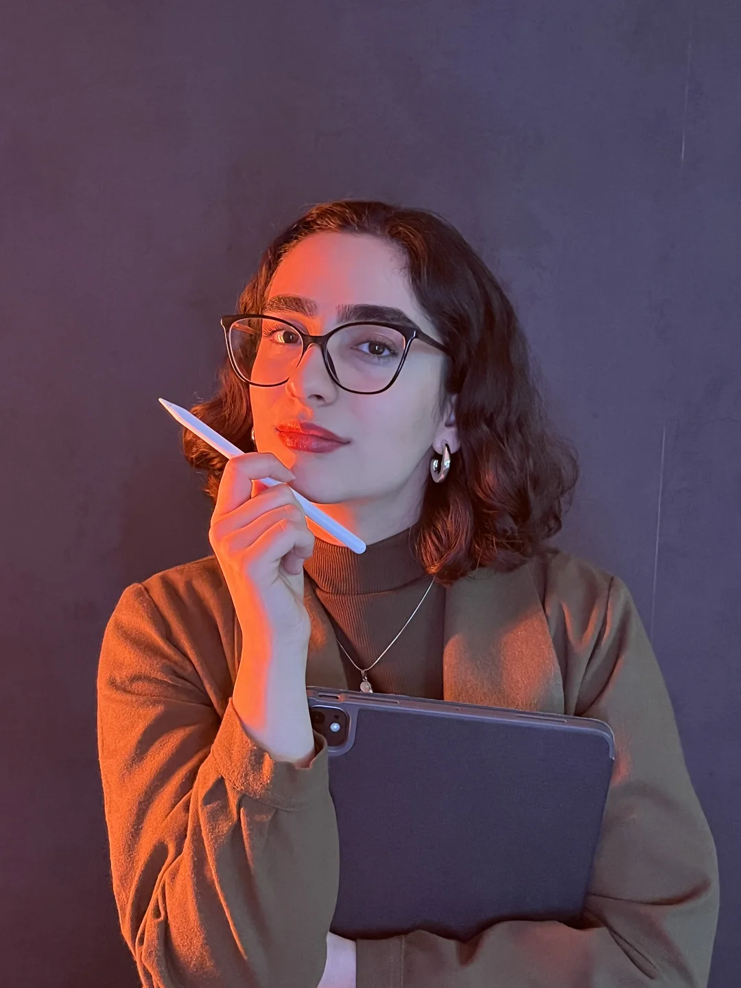 Yegane Mosayebi, video editor and creative director at Flyfish Studio, working with a digital stylus